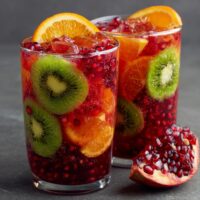 Granaatappel-Kiwi-Sinaasappelsap