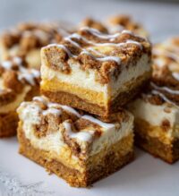 blender cinnamon roll cheesecake bars